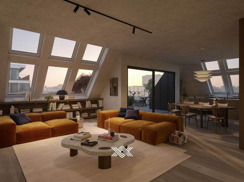 Deze riante penthouse van 188 m² beschikt over een lichtrijke leefruimte met toegang tot het zuid georiënteerd terras van 35 m² met een uitzonderlijk