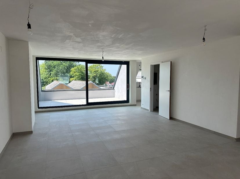 Prachtig villa-appartement, recent opgeleverde op wandelafstand van het gezellige centrum van Sleidinge. Dankzij de gunstige ligging bevinden winkels,