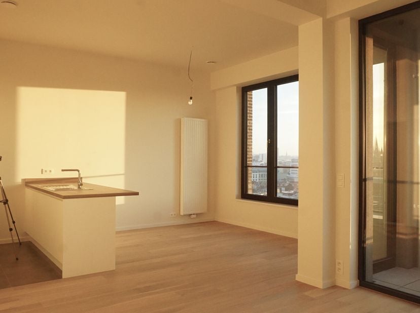 Appartement van 90?m² te huur op de 11e verdieping in het gebouw Dayton aan de Parkdreef in Tour &amp; Taxis. Het appartement is gebouwd en opgeleverd in