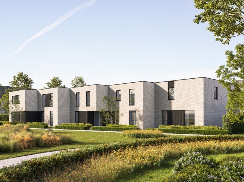 Deze halfopen moderne nieuwbouwwoning (lot 11) wordt gerealiseerd in een residentiële omgeving aan een nieuwe invalsweg van de Warandestraat. De wonin