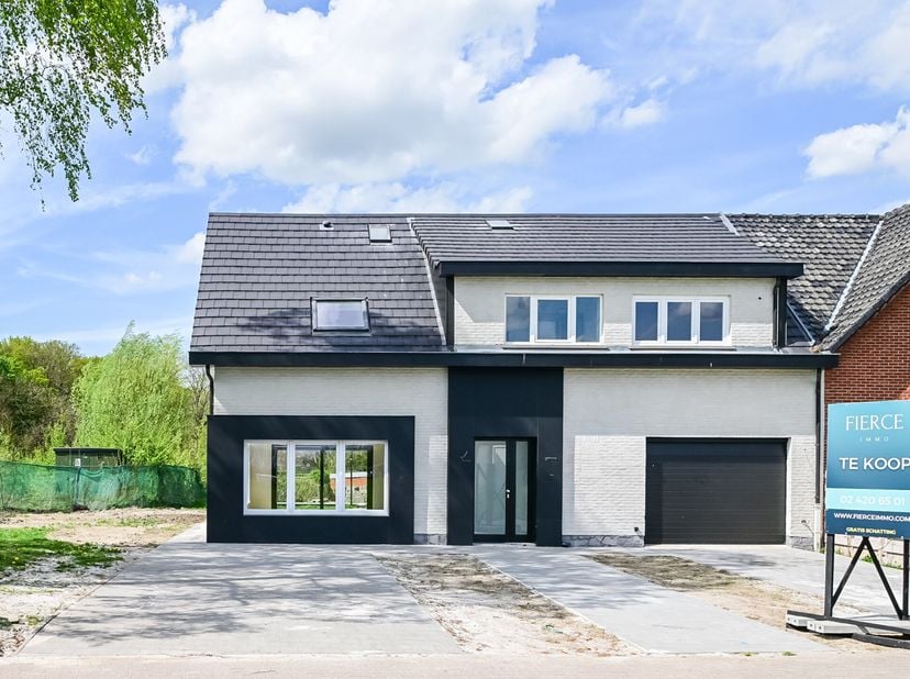 En plein centre de Meise, dans un quartier calme et verdoyant, découvrez cette magnifique maison entièrement rénovée, offrant quatre chambres, deux sa
