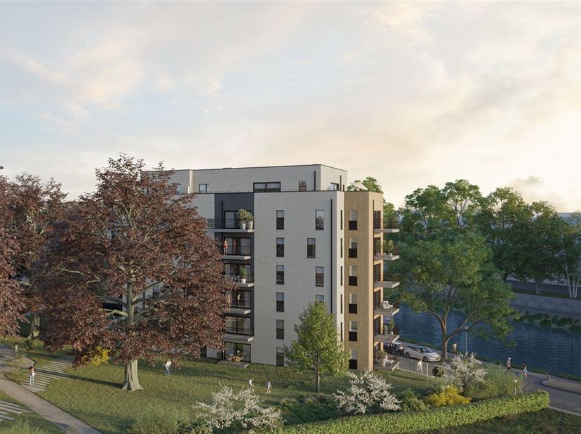En bordure de la Sambre, dans le calme dun clos arboré, le projet &quot;les Canopées&quot; propose de nombreux types d&#039;appartements de 1 à 4 chambre(s) ainsi qu