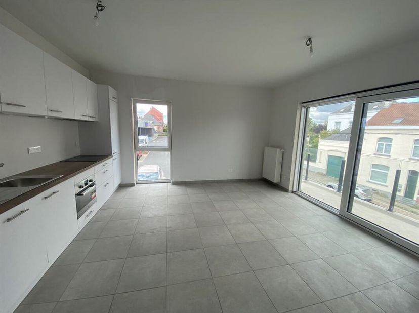 Prachtig appartement van 56 m² met balkon/terras en privéparkeerplaats in de kelder in het hart van een residentie met lift, ideaal gelegen achter het