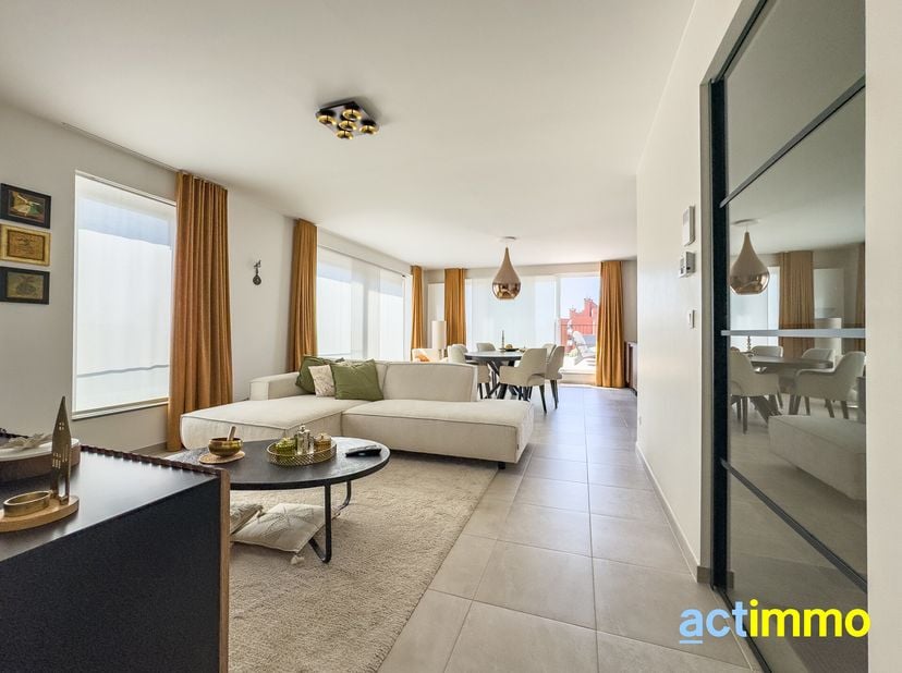 Penthouse NEUF ultra lumineux de 112 m² avec 2 chambres et grande terrasse. Allure contemporaine et orientation idéale sud-ouest. Au 2ème et dernier é