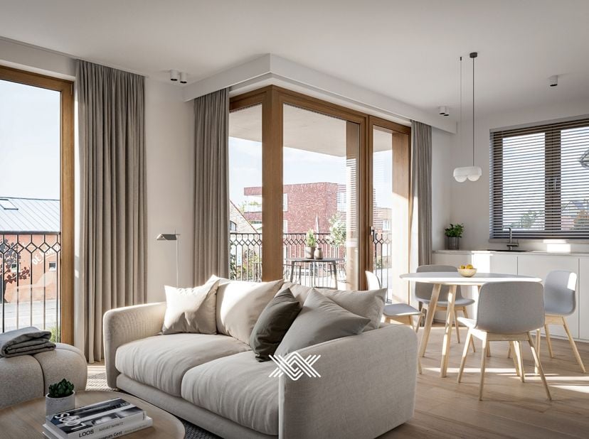 Dit tweeslaapkamer appartement van 78 m² op de eerste verdieping beschikt over een eet- en leefruimte, een open keuken met toegang tot het westelijk g