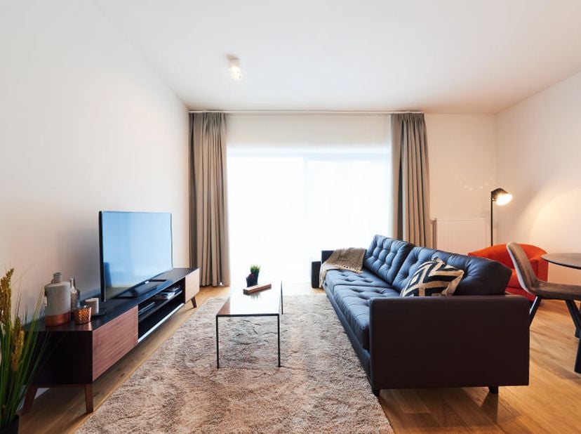 Licht appartement van 65 m² met 1 slaapkamer en een terras van 7 m² op de 5e verdieping van een recent gebouw uit 2017, La Résidence The Inside. Indel