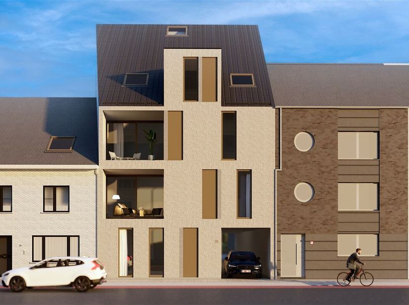 Gelegen in een éénrichtingsstraat te Sint-Gillis-Waas, vinden we dit uitstekend gelegen nieuwbouw appartement dat reeds opgeleverd is en deel uitmaakt