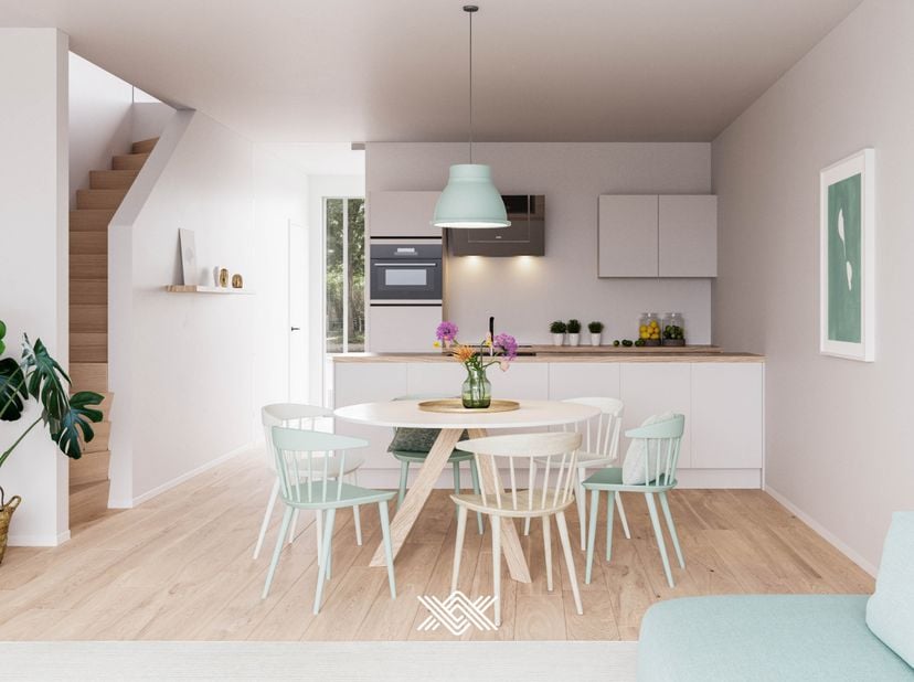 Deze koppelwoning van 180 m² bestaat uit drie bouwlagen met op het gelijkvloers een inkomhal met gastentoilet uitkomende in de eet- en leefruimte met