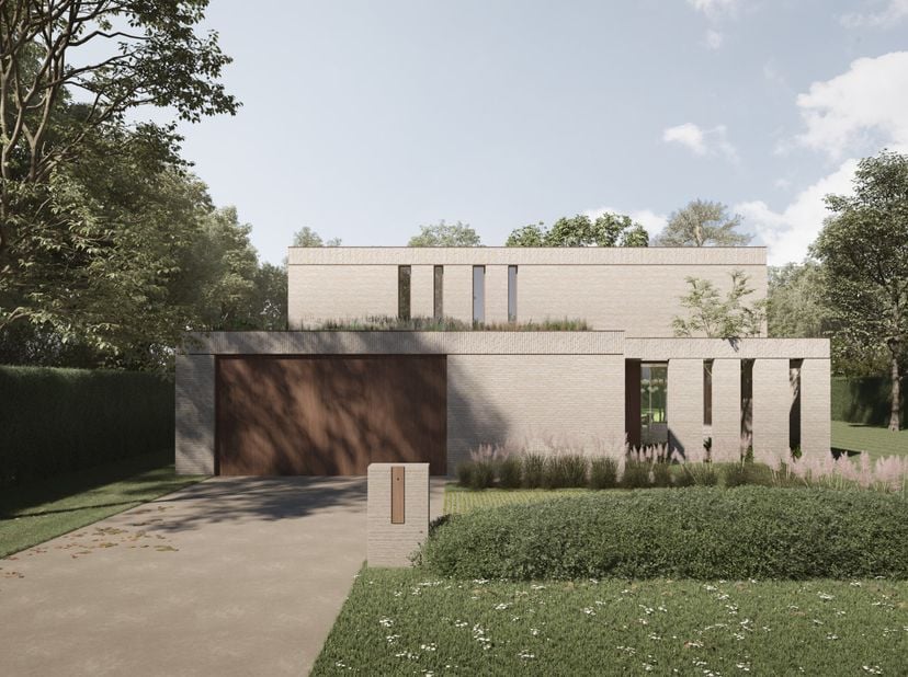 Luxueuze villa te koop. Op het gelijkvloers is een dubbele garage, een ruime wasplaats een living met tuinzicht en aanpalend een open keuken voorzien.