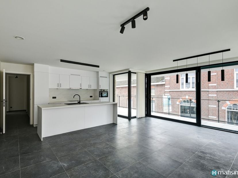 ENERGIEZUINIG APPARTEMENT MET 2 SLAAPKAMERS EN PARKEERPLAATS IN HET CENTRUM VAN BILZEN&lt;br /&gt;
&lt;br /&gt;
Dit appartement is gelegen aan de Demerwal 31/16 t