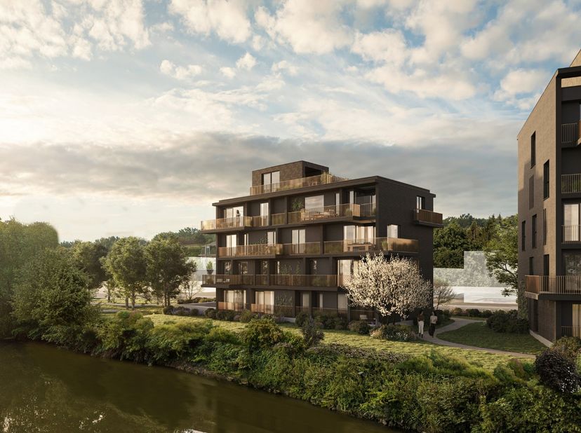 Deze penthouse van liefst 126 m² is verdeeld over de twee bovenste verdiepingen van het project Leiemeersen gelegen vlak langs de Leie in Astene.  Dit
