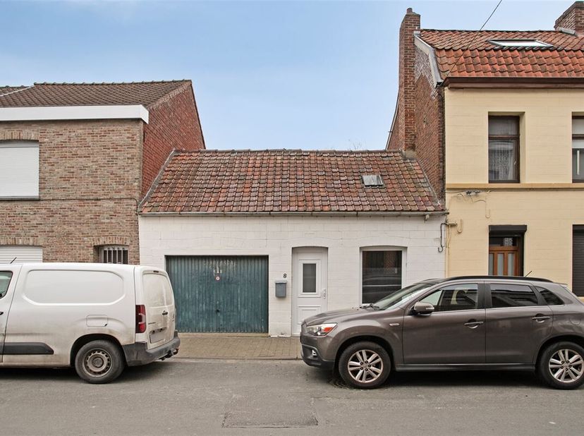 Double maison à rénover avec jardin et garage&lt;br /&gt;
Ensemble de deux maisons à rénover, idéalement situées aux portes de Tournai.&lt;br /&gt;
Elles se compo