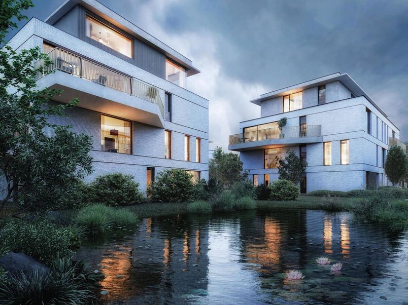 Dit lichtrijk nieuwbouwappartement situeert zich op de eerste verdieping van residentie Kasteelpark. Het omvat een inkomhal, een lichtrijke living met