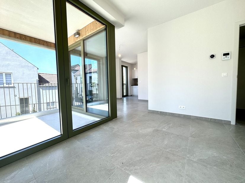 Victoire-Junot vous présente en EXCLUSIVITE - dans la Résidence Arboreto - un bel appartement de +- 60 m² situé au premier étage : petit séjour et sal